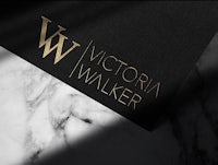 victoria walker logo on a marble table